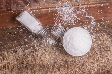 Salt crystals in a bowl. Brazilian Sal Grosso. Top view