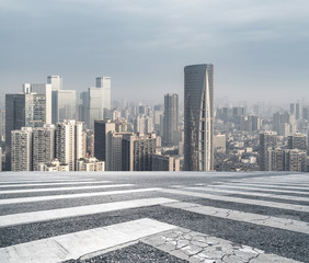 Panoramic skyline and buildings with empty road 