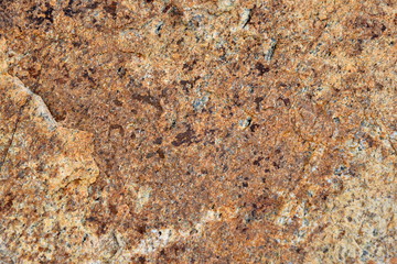 Brown stone texture with marble coating.
