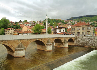 Fototapeta na wymiar Seher-cehajina Bridge over the Miljacka River in Sarajevo, Bosnia and Herzegovina