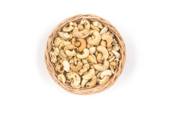 Cashew nuts in a basket bowl. Top view