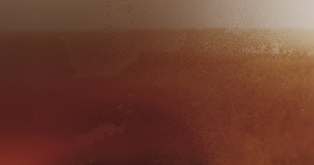 closeup pouring ale beer in a glass