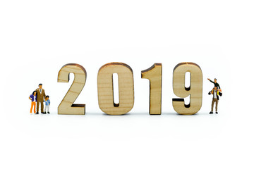 Miniature people : Family with wooden number of 2019,Happy New Year 2019 concept.