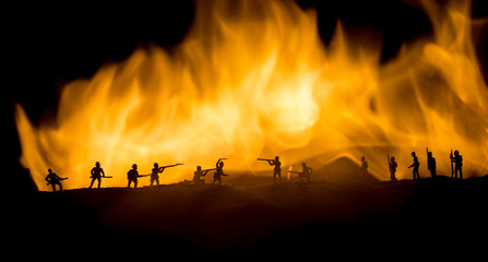 Fototapeta premium American Civil War Concept. Military silhouettes fighting scene on war fog sky background. Attack scene.