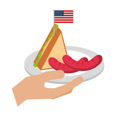 hand holding sausage and sandwich american flag