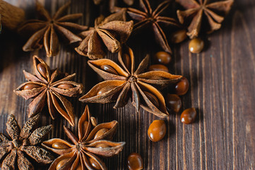 star anise on wood background. Close up of spices. Selective focus