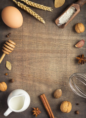 bakery ingredients on wooden background
