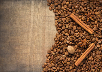 coffee beans and spices on wood