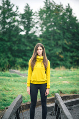 Brunette woman hiking in mountains.