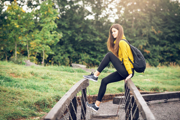 Brunette woman hiking in mountains.