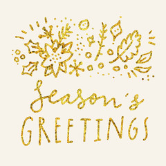 Obraz premium Season's Greetings. Merry Christmas calligraphic hand drawn greeting card in gold