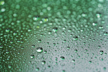 rain drops on car glass with hydrophobic coating macro photo