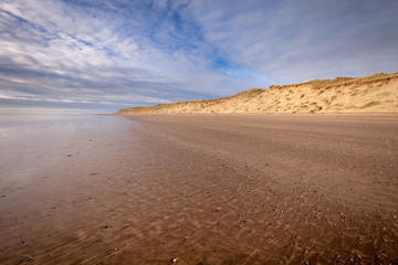 Fototapeta na wymiar Vast open sandy beach - Crow point, Devon