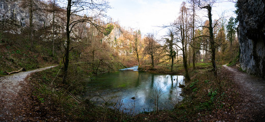 Fototapeta na wymiar Močilnik (Mocilnik) and Retovje are two main springs of Ljubljanica River in Slovenia. The springs are positioned south of the town of Vrhnika.