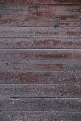 old dark wood background with snow. frost wood texture
