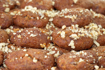Close up selected focus of greek traditional chrstmas cookies (melomakarona), with honey syrup and walnuts