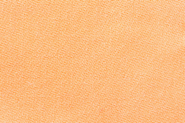 Orang fabric background texture. Detail of textile material close-up