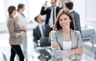 portrait of confident business woman on blurred office background