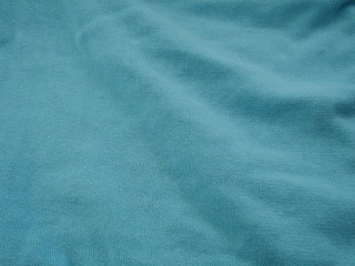 Fototapeta premium green silk fabric background,cotton cloth texture,green fabric satin 