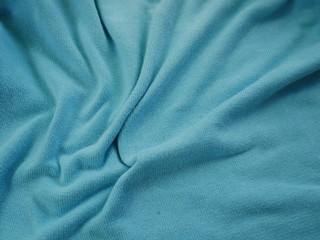 blue silk cloth,texture of fabric cotton,blue background
