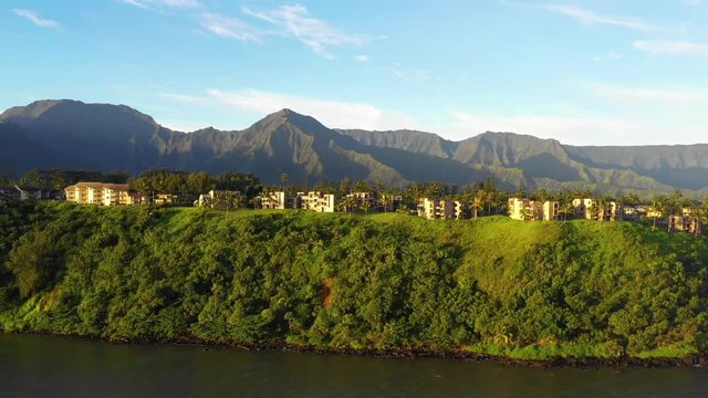 Drone Rising Up to Reveal 3D Look at Town of Princeville Kauai Hawaii Large Mountain Ridge Napali Coast