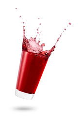 falling glass with red juice