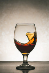 Beautiful shapes of cognac in a glass