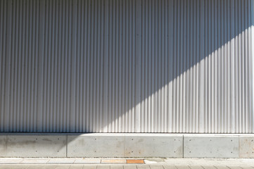 street wall background ,Industrial background, empty grunge urban street with warehouse brick wall