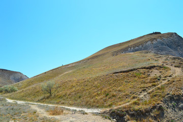 Fototapeta na wymiar Road to the top of the mountain