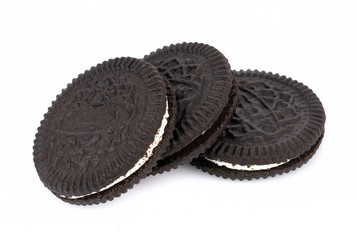 sandwich cookies with cream on white background