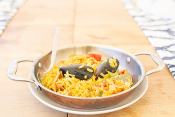 Delicious Spanish paella with mussels and seafoods