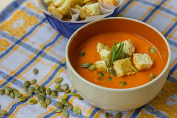 pumpkin soup with pumpkin seeds and croutons