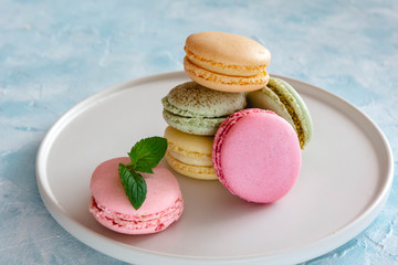 Colorful macarons cakes. Small French cakes. Sweet and colorful french macaroons.