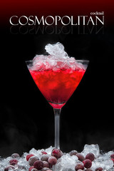cosmopolitan cocktail and frozen cranberry berries with ice Christmas holiday