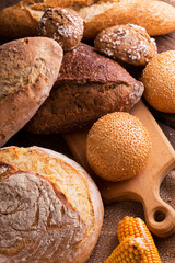 fresh bread and wheat on the wooden