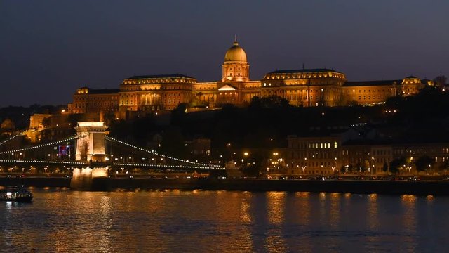 Night view of Buda part of Budapest, Hungary. Buda Castle, Royal Palace and Chain bridge over Danube.