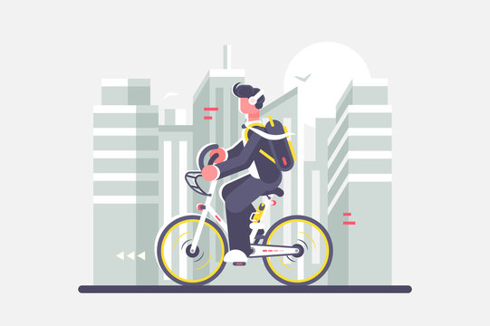 Man riding bike on cityscape background