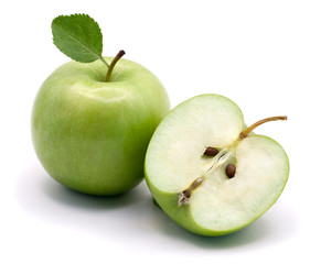 Green apples isolated on white background. Whole and cut in half.