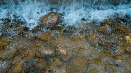 splitting water on rocks.