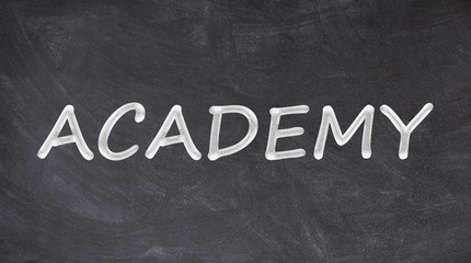 Academy written on blackboard