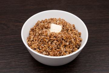 buckwheat with butter in a white plate