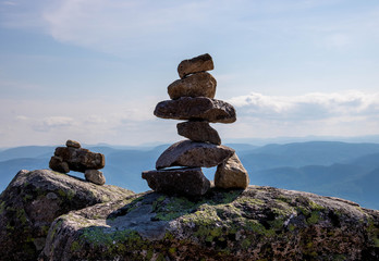 Two inukshuks (cairns) on top of a mountain in Charlevoix. 