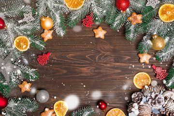 Obraz na płótnie Canvas Composition with decorated Christmas tree on dark rustic wooden background with copy space for text. Christmas mock-up or greeting card. Top view.