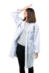 Doctor woman with stethoscope has just realized something and has intending the solution on isolated white background