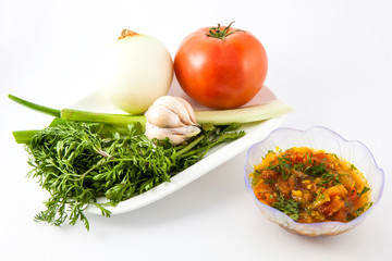 Ingredients to prepare a traditional sauce called hogao used to season the typical Colombian food