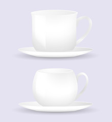 Two white coffee cup and saucer