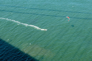 kite surfer underneath the Golden Gate Bridge