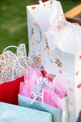 Close up on gift bags with decorative tissue paper