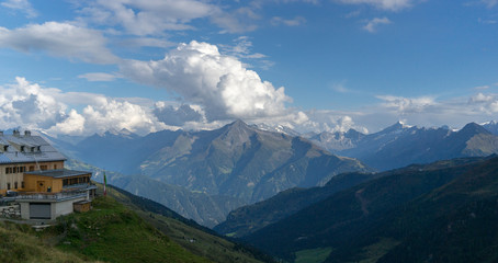 Fototapeta na wymiar Mountain hut in Alps trek vacation
