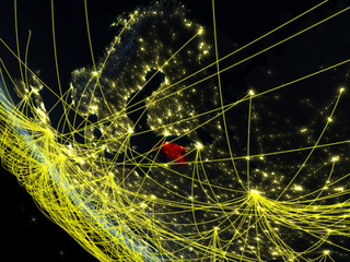 Estonia on planet Earth from space at night with network. Concept of international communication, technology and travel.